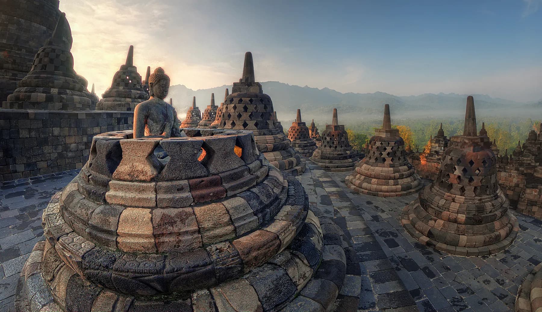 Stupas of Borobudur at sunrise