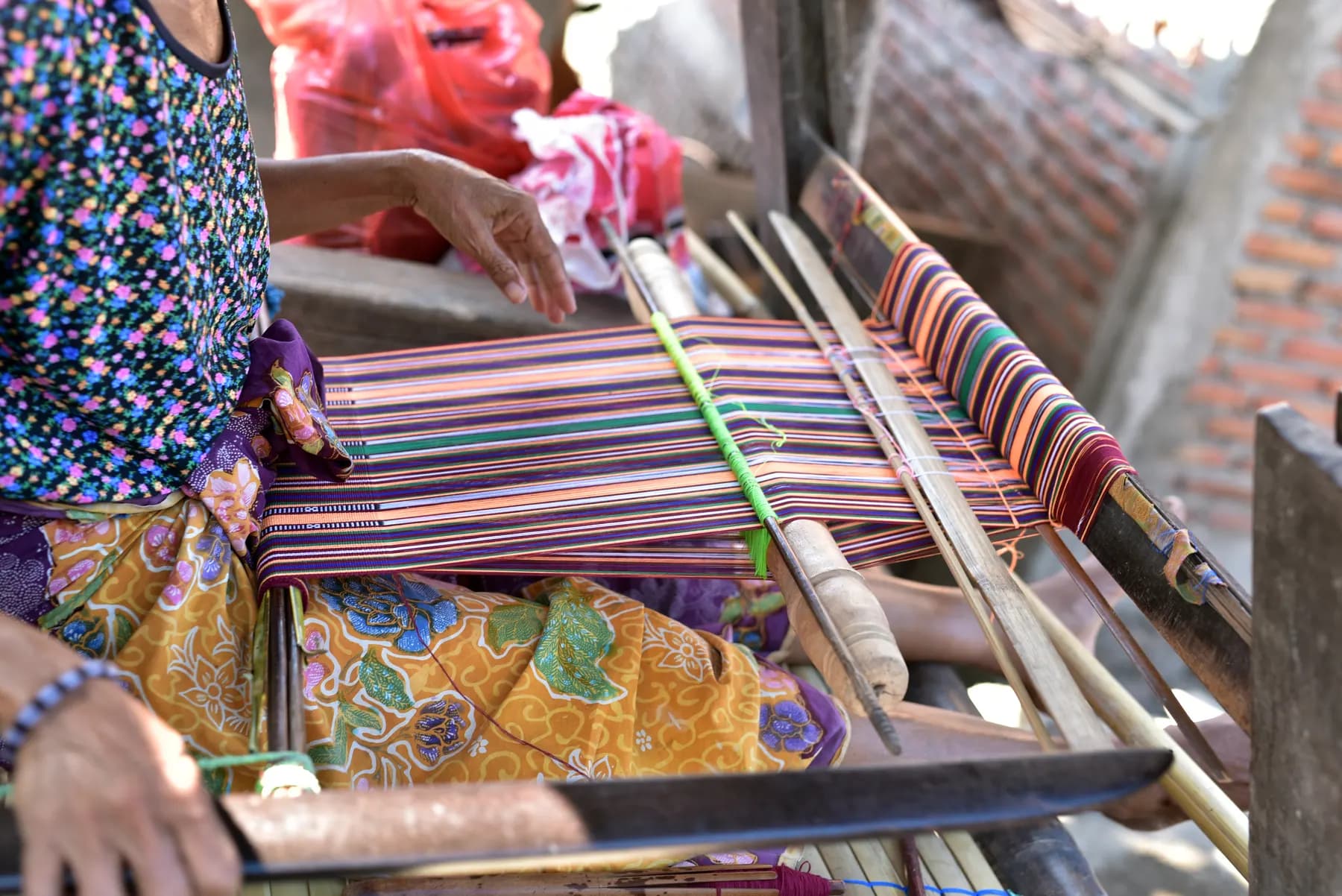 Sasak woman weaving songket in Lombok